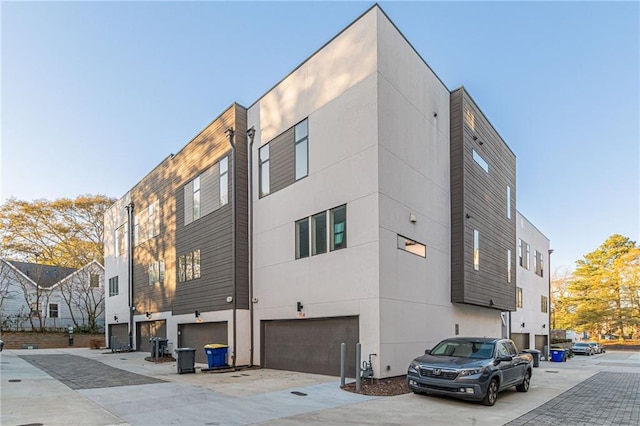 view of side of property featuring a garage