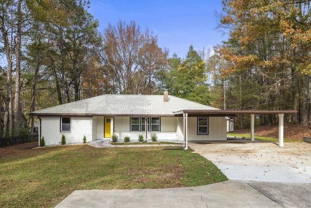 single story home featuring a front yard and a carport