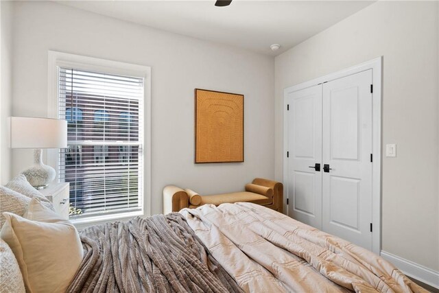 235 Briscoe Way Unit 7, Alpharetta, GA 30009 - bedroom with a ceiling fan, baseboards, and a closet