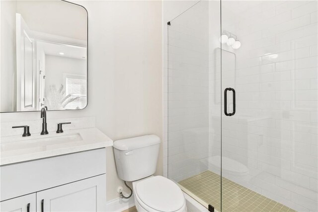 235 Briscoe Way Unit 7, Alpharetta, GA 30009 - full bathroom with a stall shower, toilet, and vanity