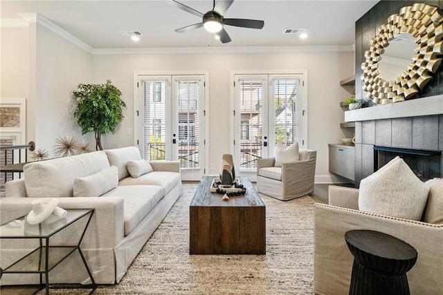235 Briscoe Way Unit 7, Alpharetta, GA 30009 - living area featuring ceiling fan, french doors, visible vents, and ornamental molding