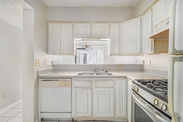 kitchen with a sink, white cabinetry, light countertops, dishwasher, and gas stove