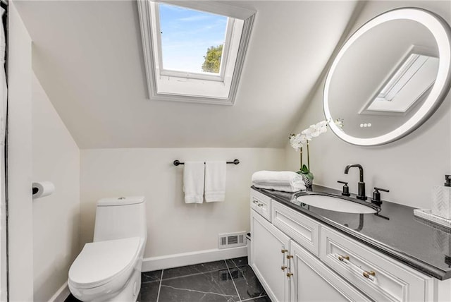 1471 Hardin Dr, College Park, GA 30337 - half bathroom with a skylight, lofted ceiling, vanity, and marble finish floors
