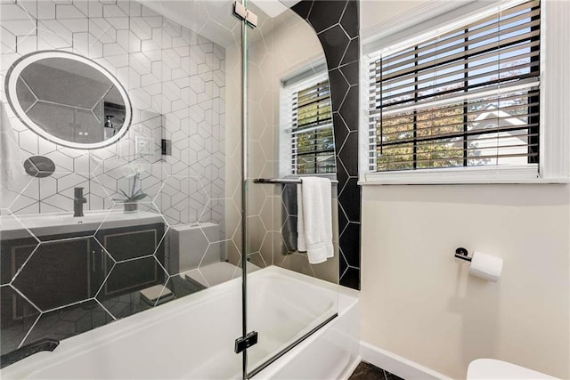 1471 Hardin Dr, College Park, GA 30337 - bathroom with plenty of natural light and bath / shower combo with glass door