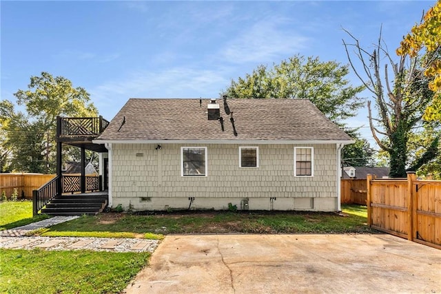 1471 Hardin Dr, College Park, GA 30337 - back of house with a fenced backyard, a shingled roof, and a patio area