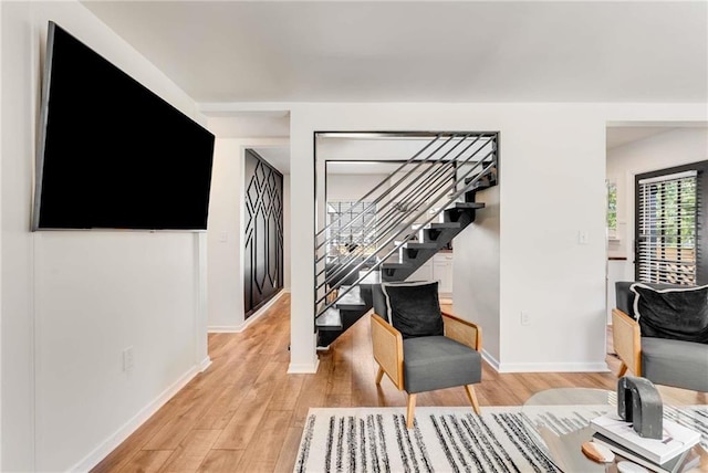 1471 Hardin Dr, College Park, GA 30337 - living area featuring light wood-style floors and stairway