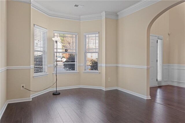 sitting room featuring crown molding and dark hardwood / wood-style floors