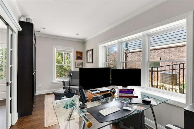 office area with dark wood finished floors, baseboards, and ornamental molding