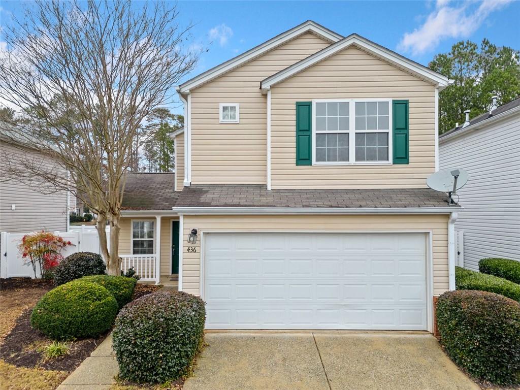 view of property with a garage