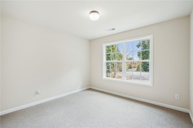 view of carpeted spare room