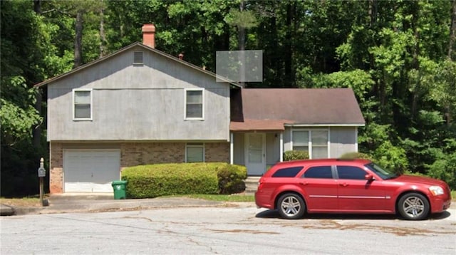 split level home with a garage