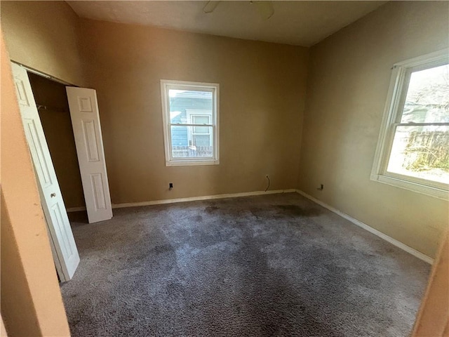 unfurnished bedroom with carpet and ceiling fan