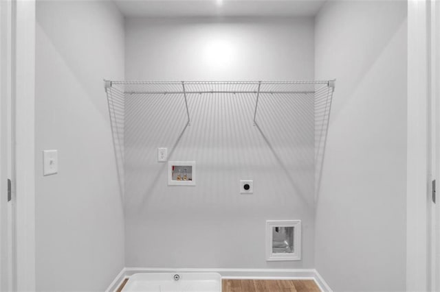 1311 Park Center Cir, Austell, GA 30168 - laundry room featuring hookup for an electric dryer, washer hookup, and wood finished floors