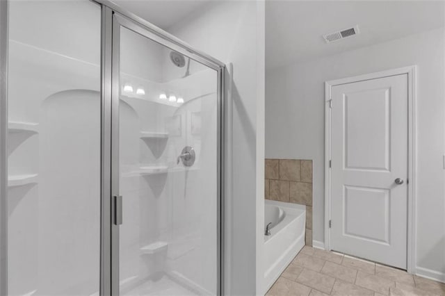 1311 Park Center Cir, Austell, GA 30168 - full bath with a garden tub, a stall shower, and tile patterned floors