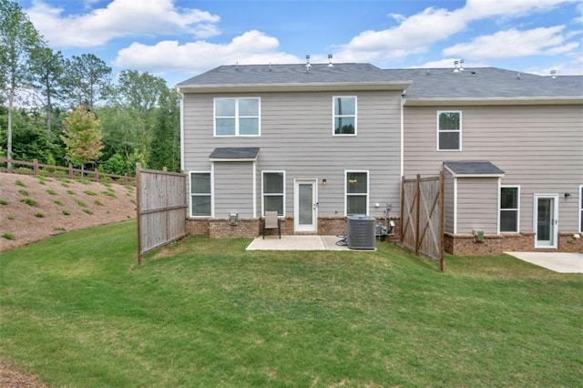 1311 Park Center Cir, Austell, GA 30168 - back of property with a patio area, brick siding, and a fenced backyard