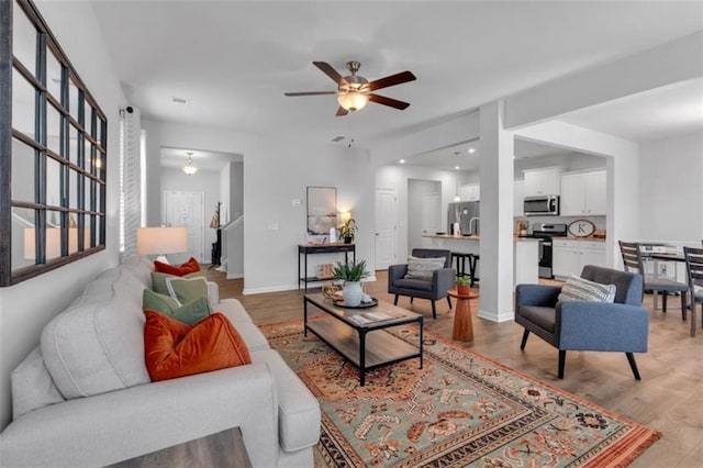 1311 Park Center Cir, Austell, GA 30168 - living room with ceiling fan and light wood-type flooring