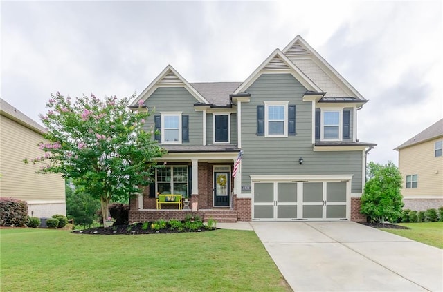 6828 New Fern Ln, Flowery Branch, GA 30542 - craftsman-style home with brick siding, covered porch, driveway, and a garage