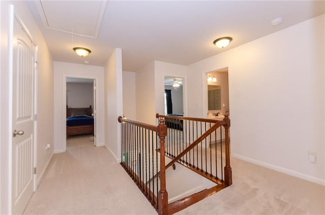 6828 New Fern Ln, Flowery Branch, GA 30542 - hallway featuring an upstairs landing, attic access, and carpet