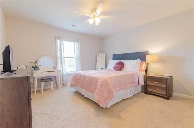 6828 New Fern Ln, Flowery Branch, GA 30542 - bedroom with light carpet and a ceiling fan