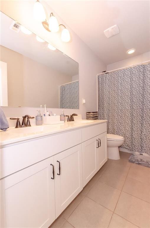 6828 New Fern Ln, Flowery Branch, GA 30542 - bathroom featuring tile patterned flooring, double vanity, and a shower with shower curtain