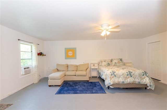 6828 New Fern Ln, Flowery Branch, GA 30542 - bedroom with finished concrete floors and a ceiling fan