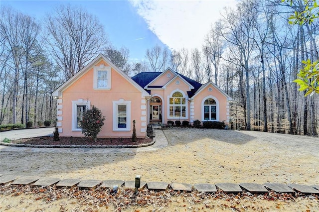 view of front of home featuring stucco siding