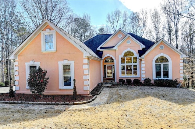 view of front of home featuring stucco siding