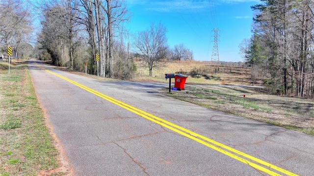 view of road featuring traffic signs