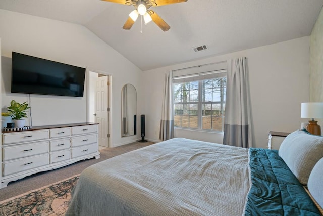 bedroom featuring lofted ceiling, light colored carpet, a ceiling fan, baseboards, and visible vents