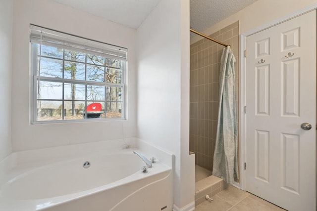 full bath with tile patterned flooring, a textured ceiling, a bath, and a shower stall