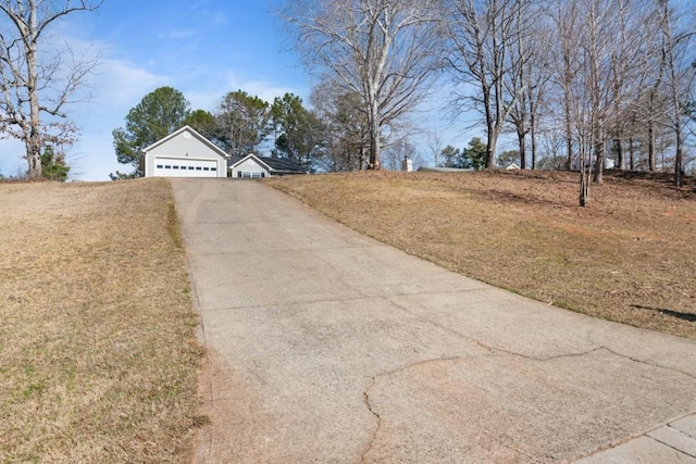 view of road featuring driveway