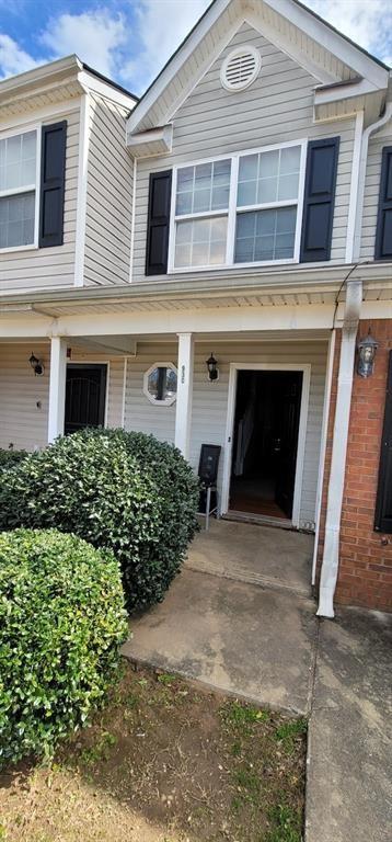 doorway to property featuring a garage