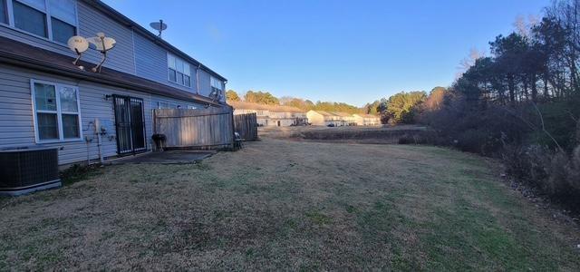 view of yard featuring central AC