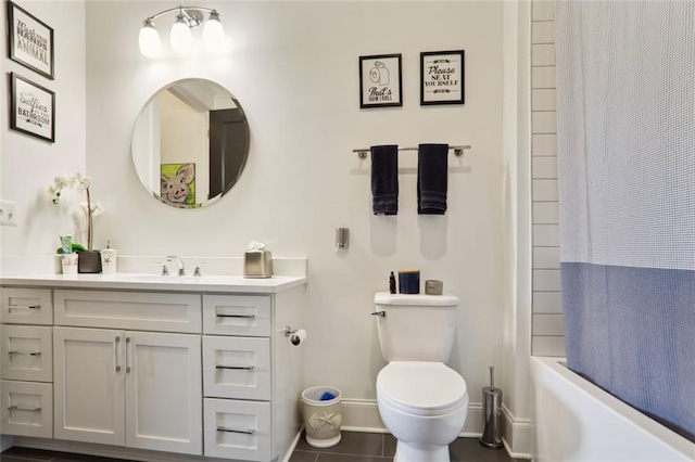 bathroom with shower / bathtub combination with curtain, vanity, toilet, and baseboards