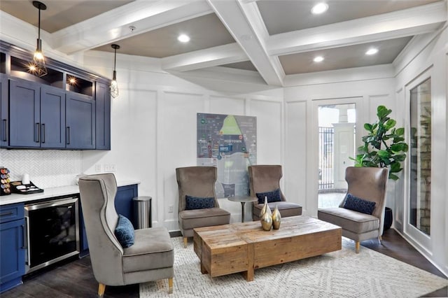 interior space featuring dark wood-style flooring, beverage cooler, a decorative wall, and beamed ceiling