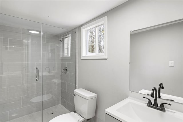 2309 Carver Dr NW, Atlanta, GA 30314 - bathroom featuring toilet, a stall shower, and vanity