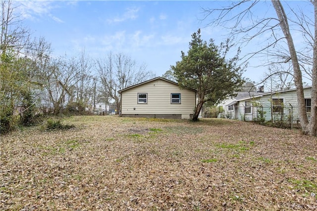2309 Carver Dr NW, Atlanta, GA 30314 - view of side of home with crawl space and fence