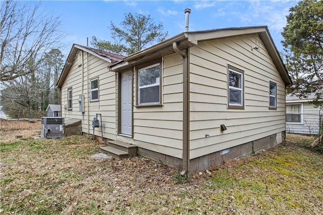 2309 Carver Dr NW, Atlanta, GA 30314 - view of side of home with entry steps, central AC unit, and crawl space