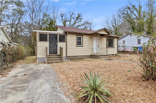 2309 Carver Dr NW, Atlanta, GA 30314 - view of front of home featuring fence and roof with shingles