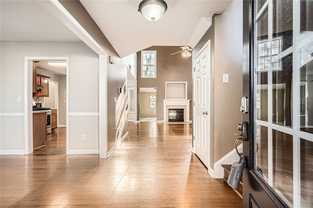 entryway featuring ceiling fan and hardwood / wood-style floors