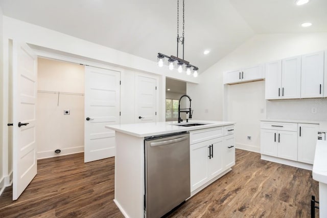 kitchen with a sink, decorative light fixtures, dark wood-type flooring, vaulted ceiling, and stainless steel dishwasher