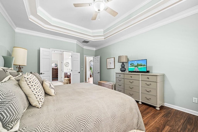 7731 Sleepy Lagoon Way, Flowery Branch, GA 30542 - bedroom featuring a raised ceiling, dark wood finished floors, crown molding, and ceiling fan
