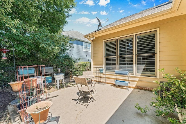 7731 Sleepy Lagoon Way, Flowery Branch, GA 30542 - view of patio / terrace with outdoor dining area