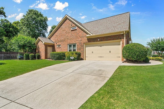 7731 Sleepy Lagoon Way, Flowery Branch, GA 30542 - view of front facade featuring concrete driveway, brick siding, a garage, and roof with shingles