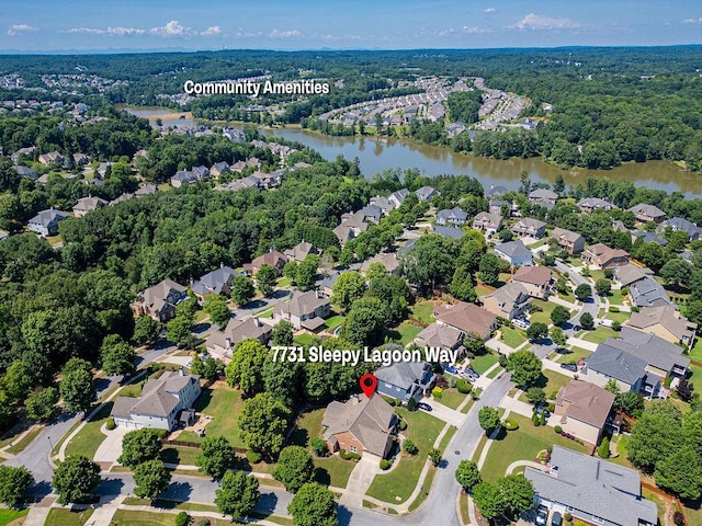 7731 Sleepy Lagoon Way, Flowery Branch, GA 30542 - aerial overview of property's location with a large body of water and nearby suburban area