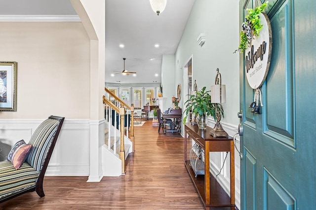 7731 Sleepy Lagoon Way, Flowery Branch, GA 30542 - foyer with a ceiling fan, arched walkways, wood finished floors, stairs, and recessed lighting