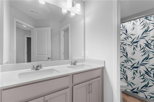 4238 Linworth Blvd, Austell, GA 30106 - bathroom with double vanity, toilet, and a shower with curtain
