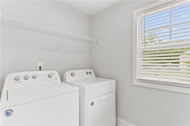 4238 Linworth Blvd, Austell, GA 30106 - laundry area with separate washer and dryer and baseboards