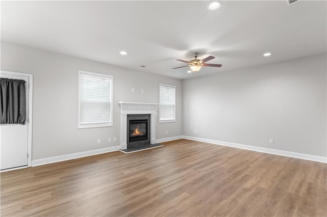 4238 Linworth Blvd, Austell, GA 30106 - unfurnished living room featuring ceiling fan, recessed lighting, baseboards, and light wood-type flooring