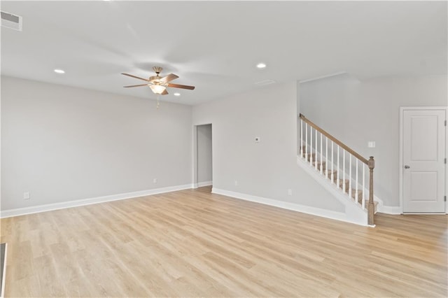 4238 Linworth Blvd, Austell, GA 30106 - unfurnished living room with a ceiling fan, stairs, light wood-style floors, baseboards, and recessed lighting